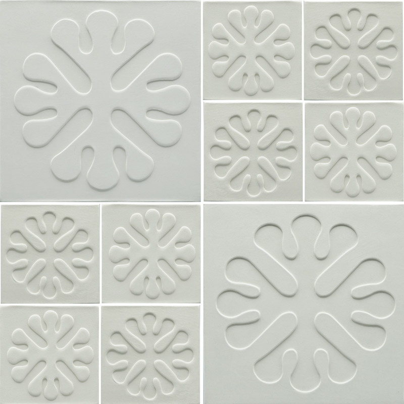 Collage of the belfry art tile in sizes 4 inches and 8 inches, embossed and debossed.