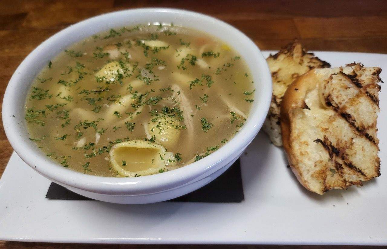 Haus Made Chicken Noodle Soup with Caramelized Onion Dinner Roll